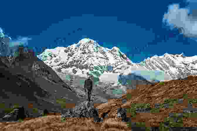 A Group Of Trekkers Enjoying The Panoramic View Of The Annapurna Base Camp, Showcasing The Stunning Beauty Of The Himalayas. Lonely Planet Nepal (Travel Guide)