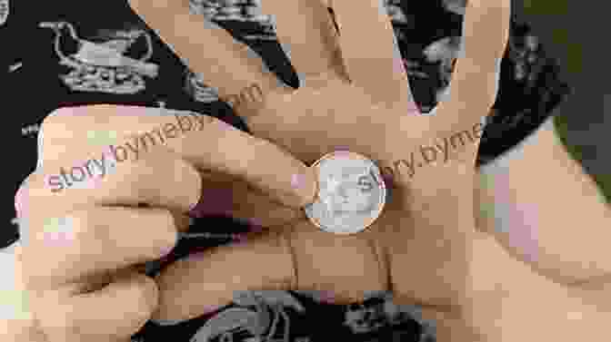 A Magician Holding A Coin Between Their Fingers, Showcasing A Classic Coin Vanish Basic Magic Tricks: Easy Tricks And Simple Stunts To Wow For Beginner Magicians