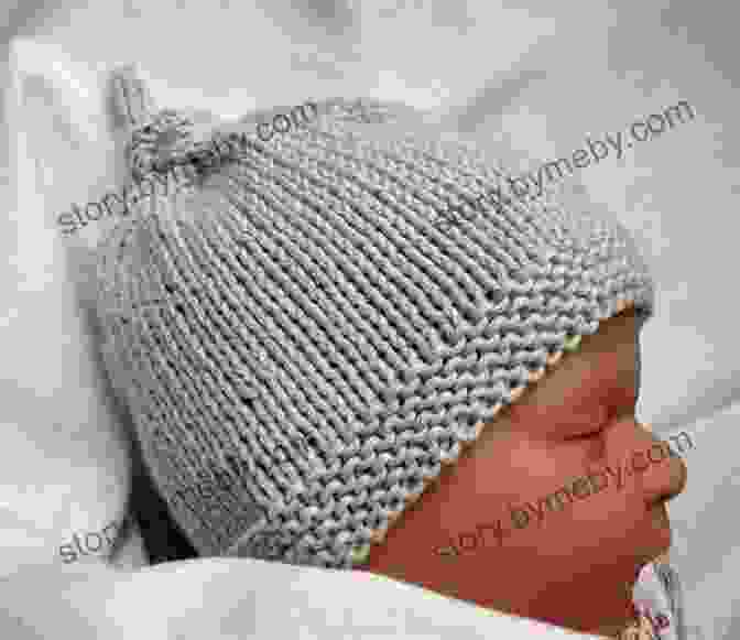 A Small, Tiny Preemie, Newborn, Or 3 Month Old Baby Bonnet Knit In A Ribbed Pattern With Cute Little Earflaps. Knitting Pattern KP546 Small Tiny Preemie Newborn 0 3mths Baby Bonnet USA Terminology