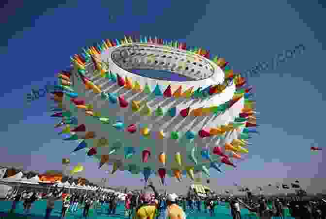 A Vibrant Crowd Gathered At A Kite Festival, With A Multitude Of Colorful And Intricately Designed Kites Soaring Above. The Story Of Kites: Amazing Chinese Inventions