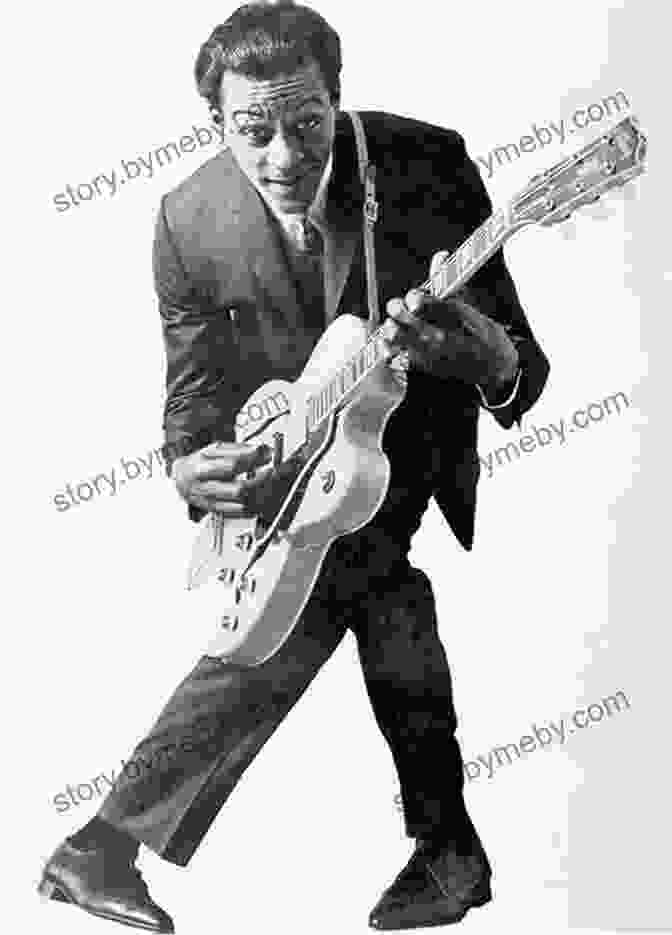 Chuck Berry Holding Multiple Awards, Symbolizing His Contributions To Music Sam Phillips: The Man Who Invented Rock N Roll