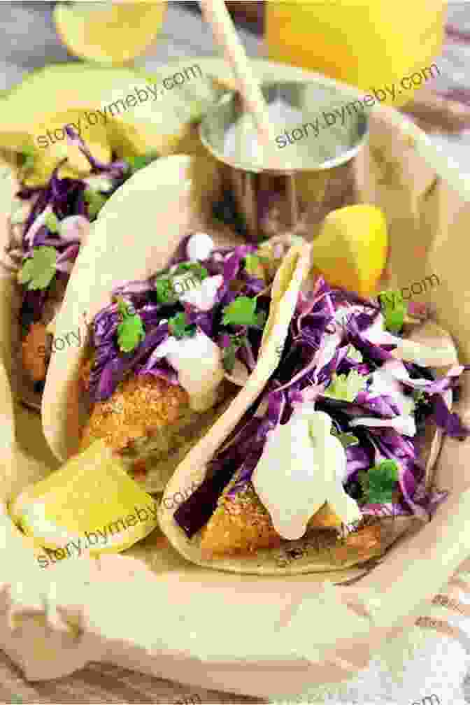 Crispy, Flaky Baja Fish Tacos, Adorned With Vibrant Cabbage Slaw And Tangy Crema The Taco Tuesday Cookbook: 52 Tasty Taco Recipes To Make Every Week The Best Ever