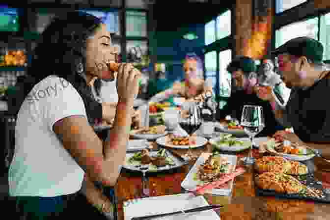 Group Of People Enjoying A Meal At A Restaurant A Taste Of Coral Gables: Cookbook And Culinary Tour Of The City Beautiful