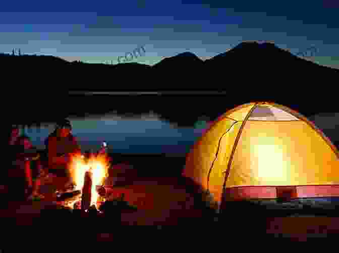 Image Of A Well Lit Campsite With A Tent, Campfire, And Chairs The Ultimate Guide To Hiking: More Than 100 Essential Skills On Campsites Gear Wildlife Map Reading And More (A BSA Scouting Guide)