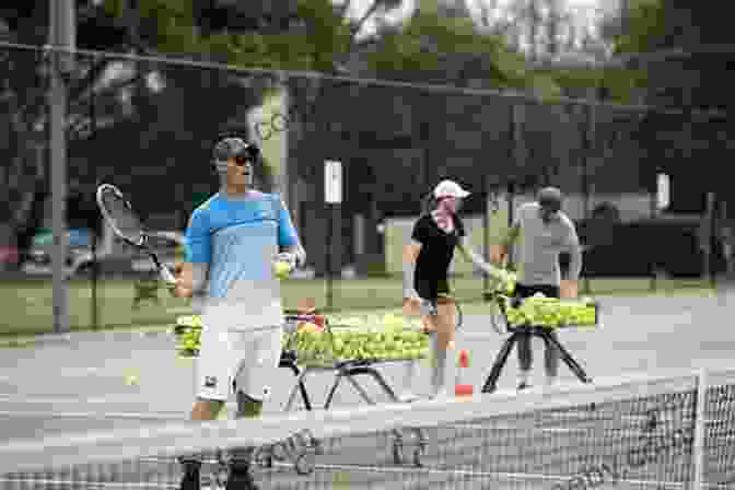 Tennis Coach Encouraging A Player During Practice Building A Champion: The Fundamentals Of Playing And Coaching Tennis